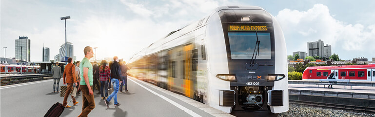 Ein Rhein-Ruhr-Express Zug hält an einem Bahnsteig mit Fahrgästen